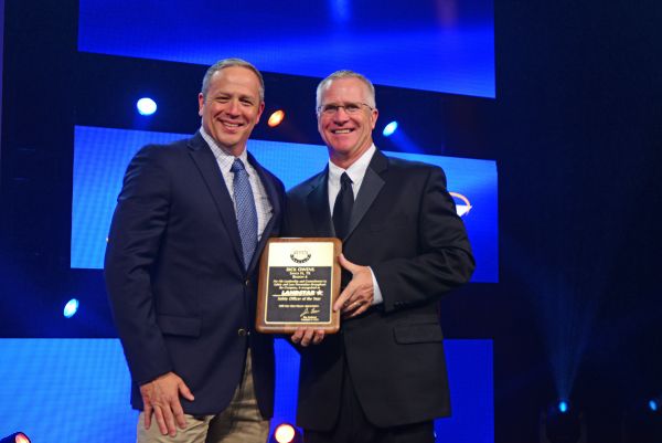 Landstar President and CEO Jim Gattoni with Landstar Safety Officer of the Year recipient Rick Owens.