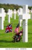 stock-photo-british-and-american-flags-and-flowery-wreath-by-grave-cross-in-the-american-war-cem.jpg
